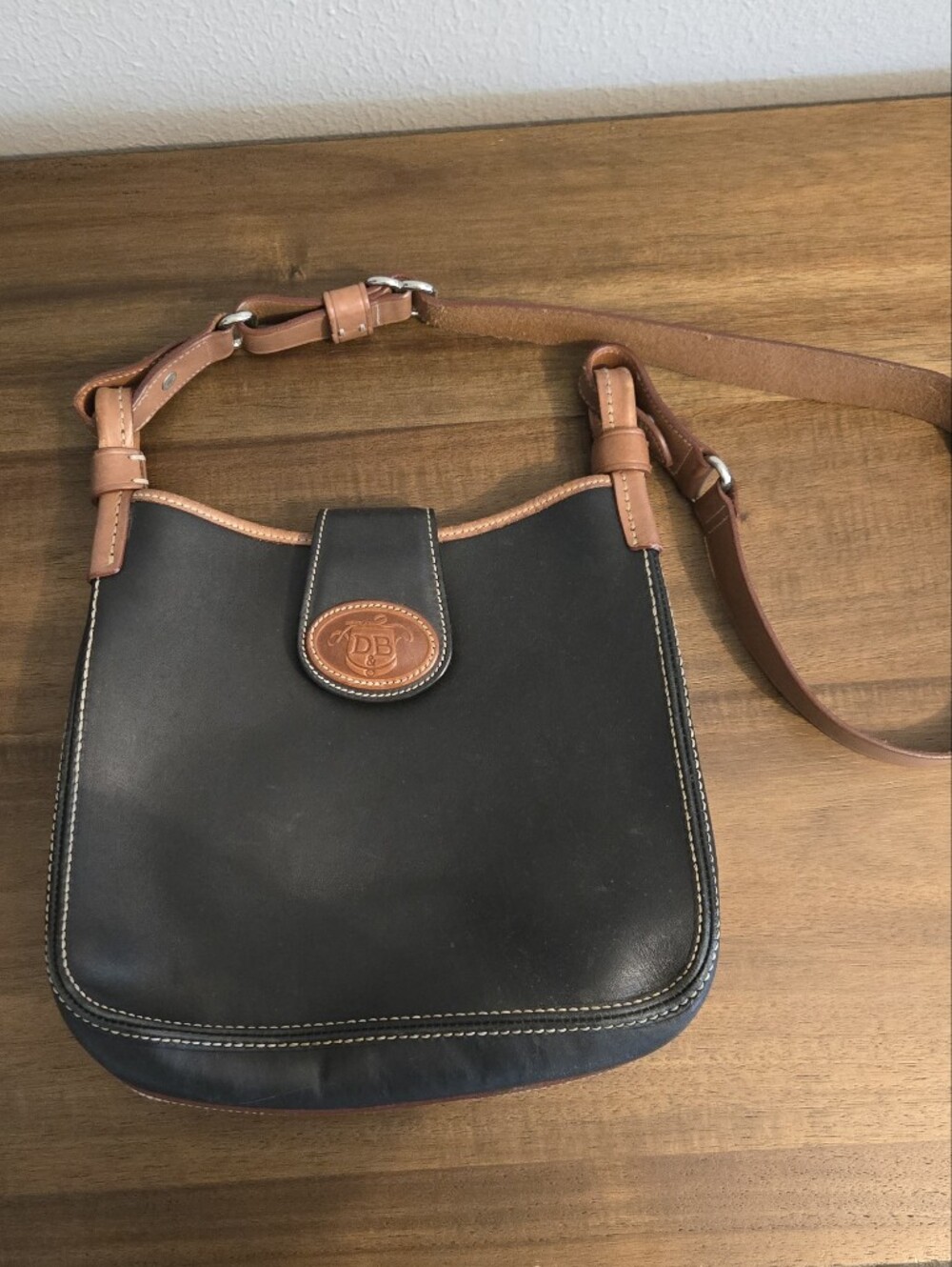 Dooney & Bourke Black with Brown Trim Leather Messenger Bag